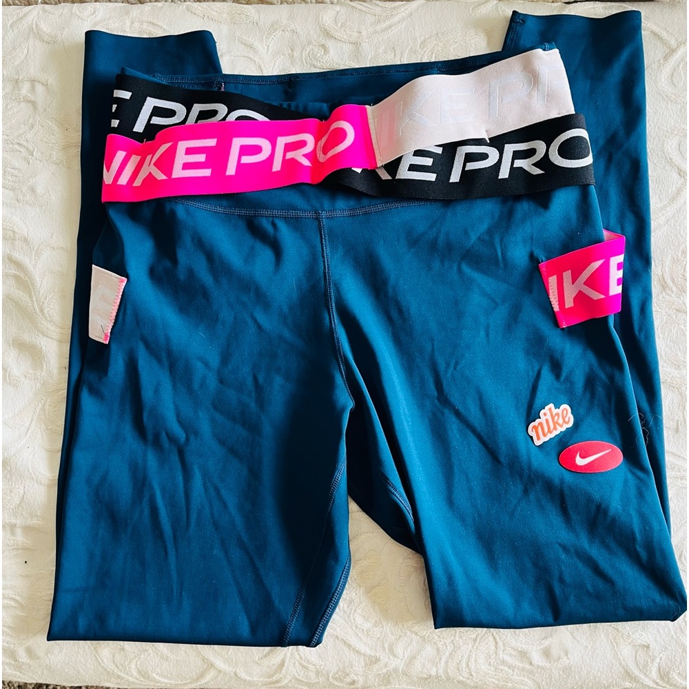 Nike Pro tights ~ great shape , no holes barely worn.. dark teal color